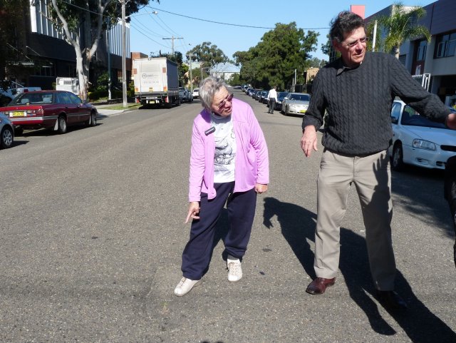 Margaret Slowgrove showing Peter Read hole in road where locals put cricket stumps for kids in Botany 1940s